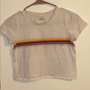 White rainbow striped shirt.